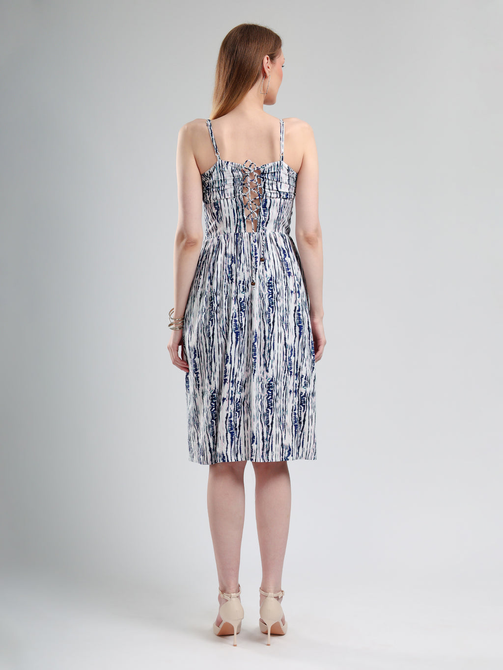 blue and white patterned dress back pose