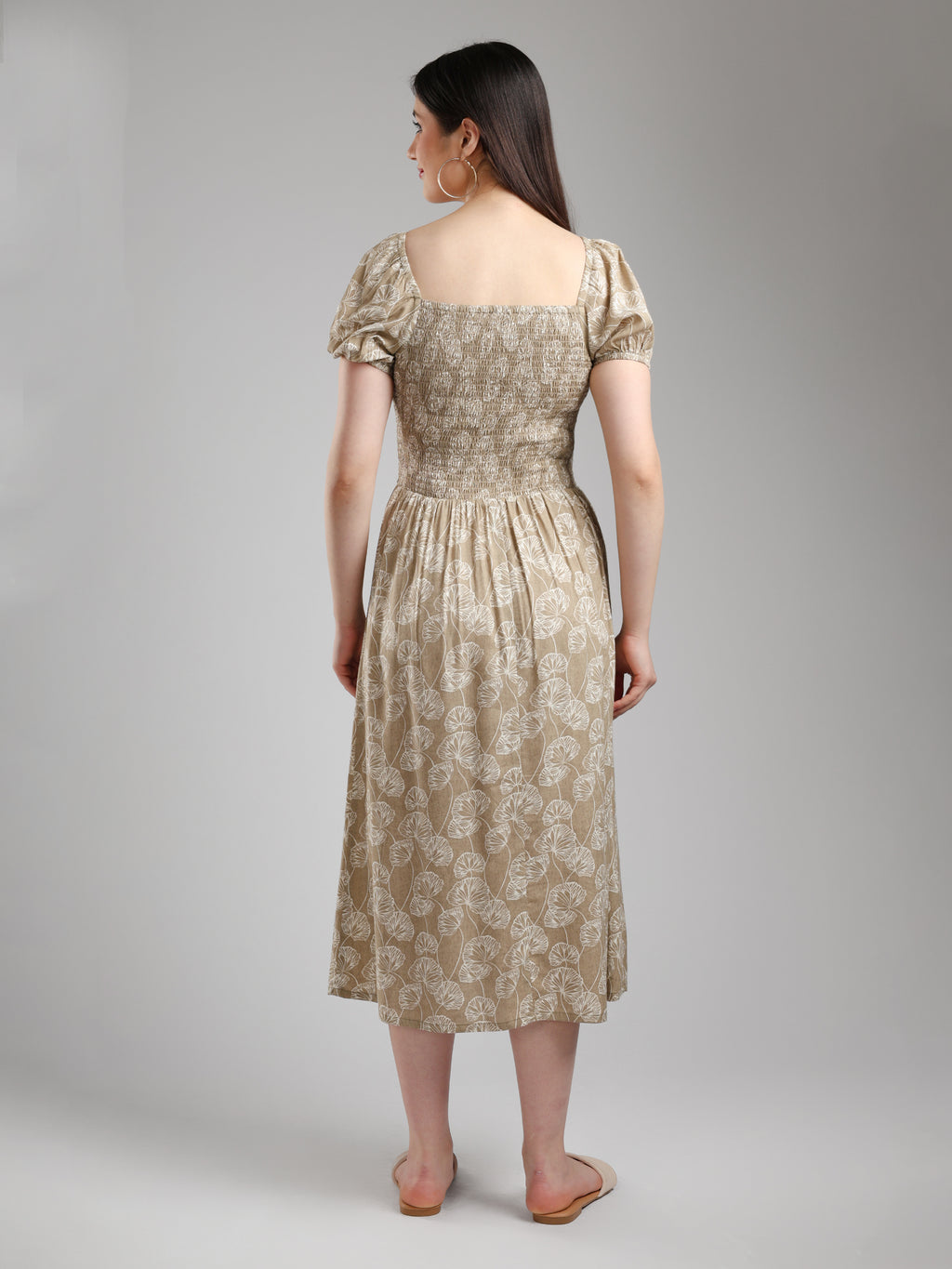 Woman wearing a floral  midi dress