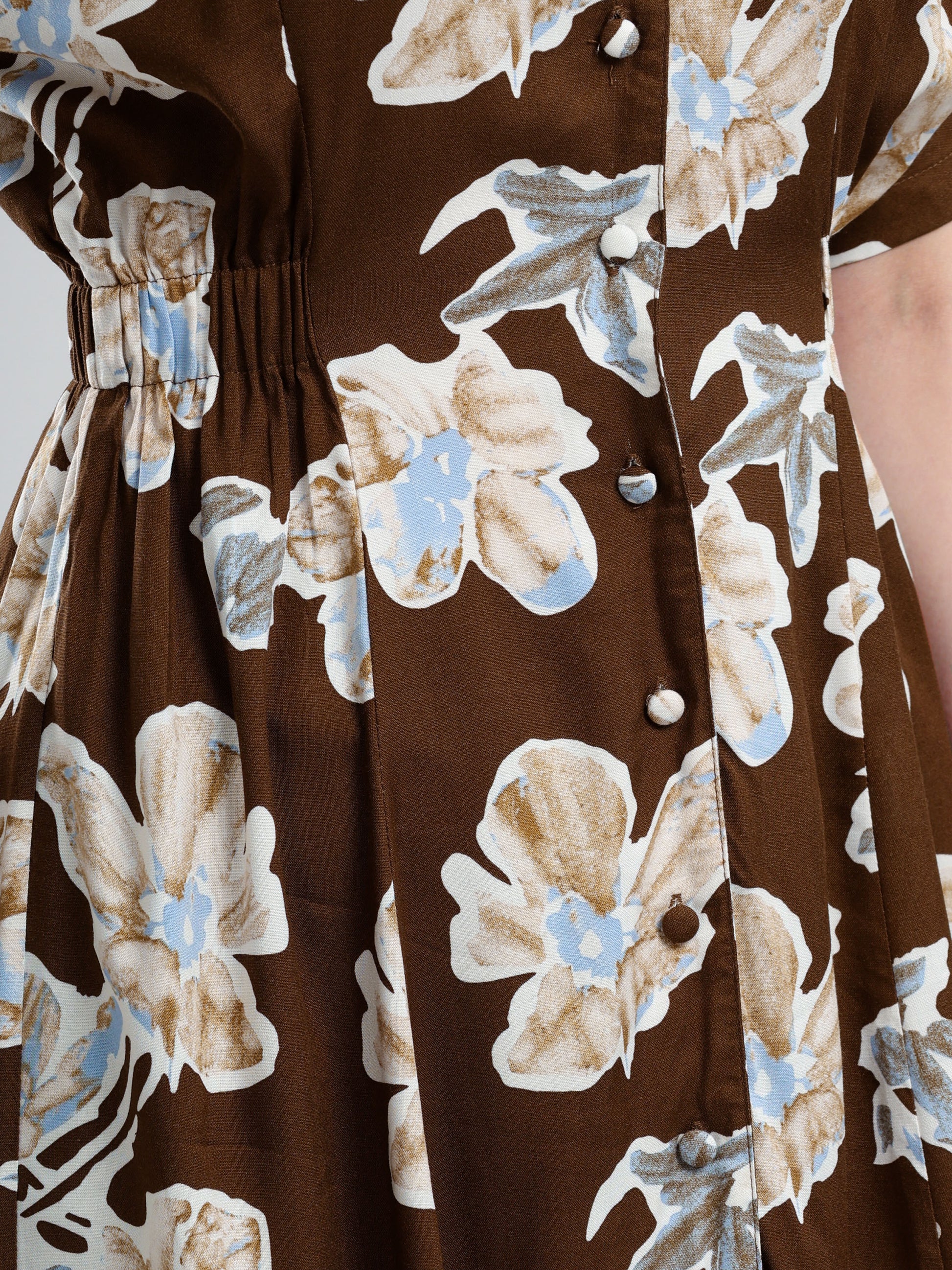Brown dress with floral pattern 