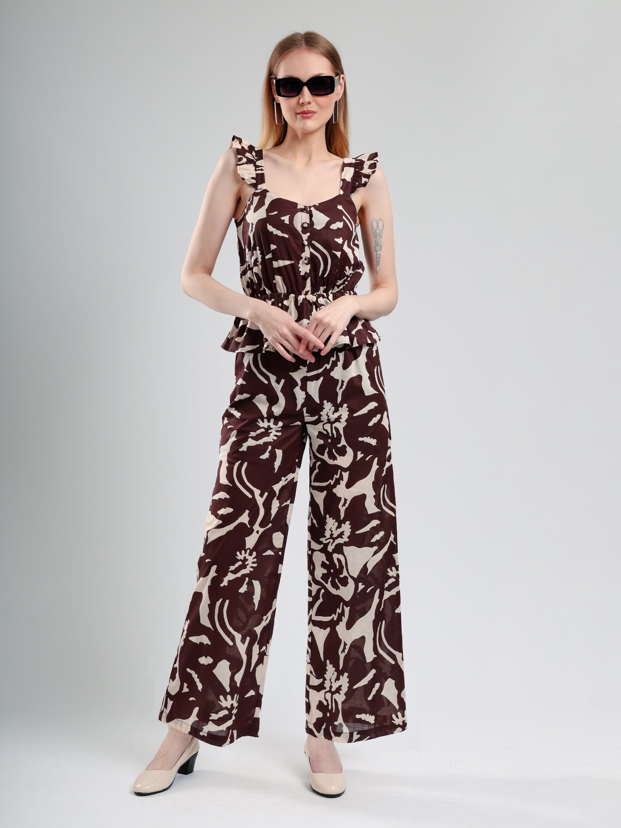 Woman wearing a patterned jumpsuit 