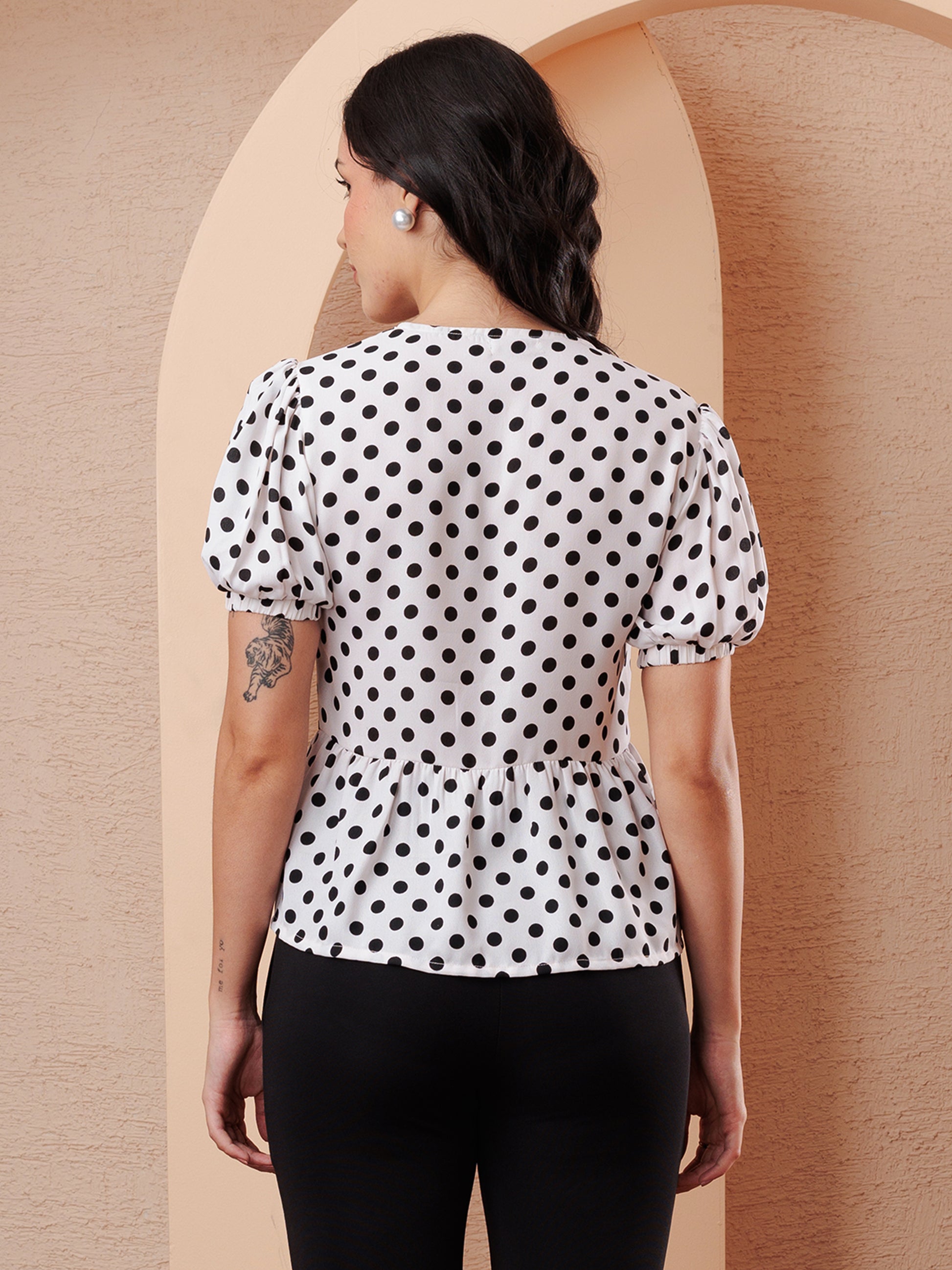 BACK SDE PEPLUM TOP